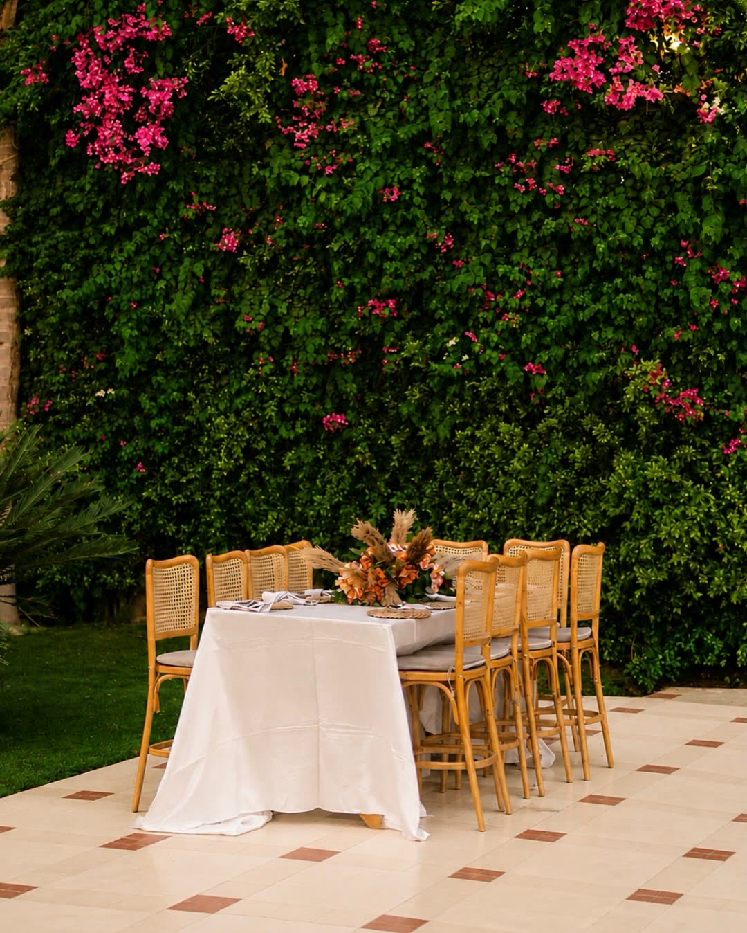 Katb el kitab table dressed with bougainvillea